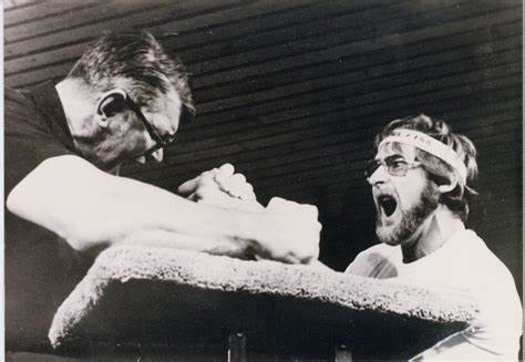 John Miazdzyk competing in a historical armwrestling match